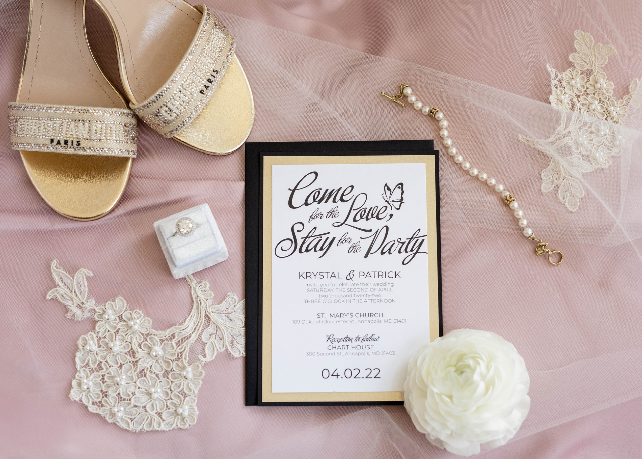 Wedding Table with wooden crossback chairs, light blue tablecloth and hydrangea florals.