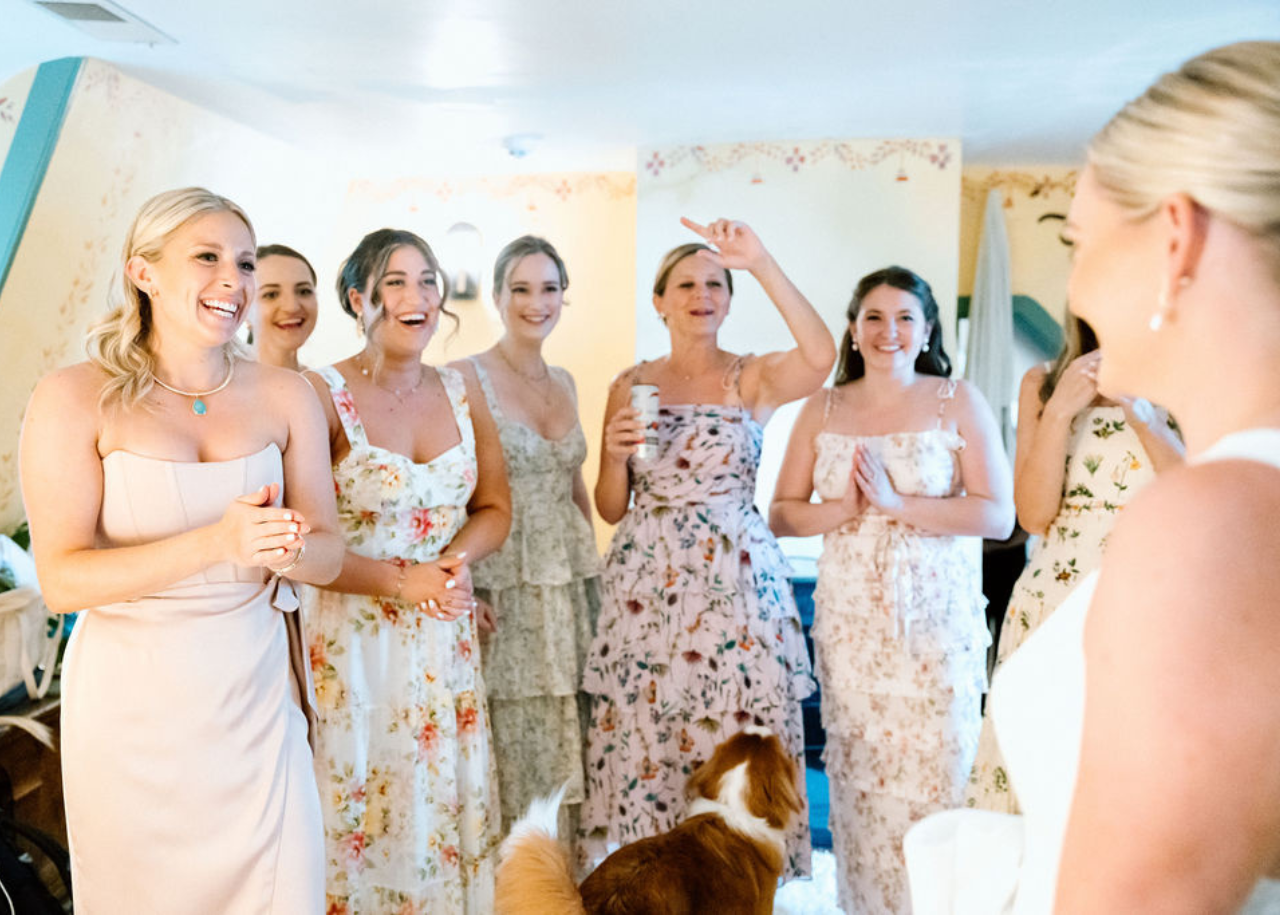 hall06 Wedding Table with wooden crossback chairs, light blue tablecloth and hydrangea florals.